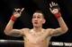 SINGAPORE - JANUARY 04: Max Holloway reacts after defeating Will Chope during their UFC Fight Night Singapore featherweight bout at Marina Bay Sands on January 4, 2014 in Singapore. (Photo by Suhaimi Abdullah/Getty Images)