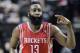 Houston Rockets guard James Harden flashes three fingers after scoring a three point shot during the second half of Game 3 of an NBA basketball first-round playoff series against the Portland Trail Blazers in Portland, Ore., Friday, April 25, 2014. Harden scored 37 points as the Rockets won 121-116. (AP Photo/Don Ryan)
