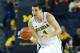 ANN ARBOR, MI - DECEMBER 07: Mitch McGary #4 of the University of Michigan Wolverines drives the ball up the court during the second half of the game against Houston Baptist Huskies at the Crisler Center on December 7, 2013 in Ann Arbor, Michigan. Michigan defeated Houston 107-53. (Photo by Leon Halip/Getty Images)
