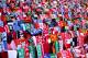 Liverpool fans hold aloft scarves & banners in the Kop end during the English Premier League soccer match between Liverpool and Manchester City at Anfield in Liverpool, England, Sunday April. 13, 2014. (AP Photo/Clint Hughes)