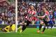 SUNDERLAND, ENGLAND - APRIL 27: Connor Wickham of Sunderland celebrates scoring his second goal with John O'Shea of Sunderland during the Barclays Premier League match between Sunderland and Cardiff City at the Stadium of Light on April 27, 2014 in Sunderland, England. (Photo by Mark Runnacles/Getty Images)