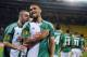 Rapid's Terrence Boyd, right, celebrates with Thanos Petsos after scoring during the Europa League group G soccer match between SK Rapid Vienna and KRC Genk, Vienna, Austria, Thursday, Nov. 7, 2013. (AP Photo/Hans Punz)p
