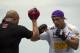 Vitor Belfort, of Brazil, right, trains during UFC Rio Open Workouts on Barra de Tijuca Beach in Rio de Janeiro, Brazil, Wednesday Jan. 11, 2012. Belfort will face Anthony Johnson, of the U.S., on Jan. 14 at the Ultimate Fighting Championship's UFC 142, the organization's second event in Rio de Janeiro. (AP Photo/Felipe Dana)