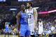Oklahoma City Thunder guard Reggie Jackson is congratulated after making a free throw in the final seconds of overtime in Game 4 of an opening-round NBA basketball playoff series against the Memphis Grizzlies Saturday, April 26, 2014, in Memphis, Tenn. Jackson scored 32 points as Oklahoma City won 92-89. (AP Photo/Mark Humphrey)