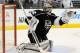 LOS ANGELES, CA - APRIL 22: Jonathan Quick #32 of the Los Angeles Kings makes a glove save during the first period against the San Jose Sharks in Game Three of the First Round of the 2014 NHL Stanley Cup Playoffs at Staples Center on April 22, 2014 in Los Angeles, California. (Photo by Harry How/Getty Images)