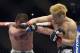 Apr 26, 2014; Baltimore, MD, USA; Takanori Gomi (right) lands a punch on Issac Vallie-Flagg during the first round in UFC 172 at Baltimore Arena. Gomi defeated Wallie-Flagg by judges decision. Mandatory Credit: Tommy Gilligan-USA TODAY Sports