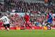 Chelsea's Demba Ba, right, scores against Liverpool during their English Premier League soccer match at Anfield Stadium, Liverpool, England, Sunday April 27, 2014. (AP Photo/Jon Super)
