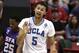 UCLA's Kyle Anderson urges on his team during the second half of a third-round game against Stephen F. Austin in the NCAA college basketball tournament, Sunday, March 23, 2014, in San Diego. (AP Photo/Gregory Bull)
