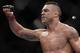 FILE - In this Jan. 20, 2013, file photo, Vitor Belfort, from Brazil, celebrates after defeating Michael Bisping, of Britian, during their middleweight mixed martial arts bout in Sao Paulo, Brazil. Belfort dropped out of his upcoming UFC middleweight title shot on Thursday, Feb. 27, 2014, a few hours after the Nevada Athletic Commission banned testosterone replacement therapy. Belfort was scheduled to fight 185-pound champion Chris Weidman at UFC 173 on May 24. His title shot was given to Lyoto Machida by UFC President Dana White. (AP Photo/Andre Penner, File)