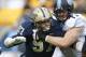 Pittsburgh defensive lineman Aaron Donald (97) in action in an NCAA football game between Pittsburgh and North Carolina, Saturday, Nov. 16, 2013 in Pittsburgh. (AP Photo/Keith Srakocic)