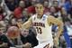Arizona guard Nick Johnson (13) moves the ball against San Diego State during the second half in a regional semifinal NCAA college basketball tournament game, Thursday, March 27, 2014, in Anaheim, Calif. (AP Photo/Jae C. Hong)