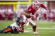 Indiana's Cody Latimer (3) is tackled by Illinois' Darius Mosely (24) during the first half of an NCAA college football game, Saturday, Nov. 9, 2013, in Bloomington, Ind. (AP Photo/Doug McSchooler)