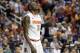 Syracuse's Jerami Grant (3) walks off the court after their loss to North Carolina State in a quarterfinal NCAA college basketball game at the Atlantic Coast Conference tournament in Greensboro, N.C., Friday, March 14, 2014. North Carolina State won 66-63. (AP Photo/Gerry Broome)