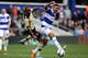 LONDON, ENGLAND - MARCH 01: Rodolph Austin of Leeds battles with Jermaine Jenas of QPR during the Sky Bet Championship match between Queens Park Rangers and Leeds United at Loftus Road on March 1, 2014 in London, England. (Photo by Ben Hoskins/Getty Images)