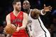 Brooklyn Nets center Kevin Garnett (2) defends as Toronto Raptors guard Greivis Vasquez (21) looks to pass in the second half of Game 4 of an NBA basketball first-round playoff series at the Barclays Center, Sunday, April 27, 2014, in New York. The Raptors evened the series at 2-2 defeating the Nets 87-79. (AP Photo/Kathy Willens)