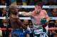 LAS VEGAS, NV - SEPTEMBER 14: (R-L) Canelo Alvarez throws a right at Floyd Mayweather Jr. during their WBC/WBA 154-pound title fight at the MGM Grand Garden Arena on September 14, 2013 in Las Vegas, Nevada. (Photo by Ethan Miller/Getty Images)