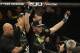 Alexander Gustafsson, from Sweden, has his arms raised after beating Mauricio