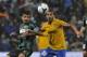 Sassuolo's Francesco Magnanelli, left, vies for the ball with Juventus's Carlos Tevez of Argentina, during their Serie A soccer match at Reggio Emilia's Mapei stadium, Italy, Monday, April 28, 2014. (AP Photo/Marco Vasini)