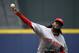Cincinnati Reds starting pitcher Johnny Cueto throws in the first inning of a baseball game against the Atlanta Braves, Sunday, April 27, 2014, in Atlanta. (AP Photo/David Goldman)