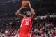 PORTLAND, OR - APRIL 27: Troy Daniels #30 of the Houston Rockets shoots against the Portland Trail Blazers in Game Four of the Western Conference Quarterfinals during the 2014 NBA Playoffs on April 27, 2014 at the Moda Center in Portland, Oregon. NOTE TO USER: User expressly acknowledges and agrees that, by downloading and or using this photograph, User is consenting to the terms and conditions of the Getty Images License Agreement. Mandatory Copyright Notice: Copyright 2014 NBAE (Photo by Sam Forencich/NBAE via Getty Images)