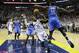 Memphis Grizzlies guard Mike Conley (11) is fouled by Oklahoma City Thunder forward Kevin Durant (35) in the second half of Game 4 of an opening-round NBA basketball playoff series Saturday, April 26, 2014, in Memphis, Tenn. Oklahoma City won in overtime 92-89. (AP Photo/Mark Humphrey)