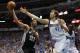 Apr 28, 2014; Dallas, TX, USA; San Antonio Spurs forward Tim Duncan (21) shoots against Dallas Mavericks forward Dirk Nowitzki (41) during the first half in game four of the first round of the 2014 NBA Playoffs at American Airlines Center. Mandatory Credit: Matthew Emmons-USA TODAY Sports