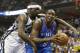 Memphis Grizzlies forward Zach Randolph (50) defends against Oklahoma City Thunder center Kendrick Perkins (5) in the second half of Game 4 of an opening-round NBA basketball playoff series Sunday, April 27, 2014, in Memphis, Tenn. (AP Photo/Mark Humphrey)