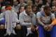 New York Knicks' Carmelo Anthony, left, J.R. Smith, center, and Amar'e Stoudemire, right, watch their team play during the first half of an NBA basketball game against the Philadelphia 76ers Monday, March 10, 2014, in New York. (AP Photo/Frank Franklin II)