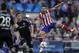Atletico's Diego, right, goes for the ball with Chelsea's Frank Lampard during the Champions League semifinal first leg soccer match between Atletico Madrid and Chelsea at the Vicente Calderon stadium in Madrid, Spain, Tuesday April 22, 2014. (AP Photo/Gabriel Pecot)
