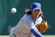 Chicago Cubs starting pitcher Jeff Samardzija throws a warmup pitch between innings during their opening day baseball game against the Pittsburgh Pirates on Monday, March 31, 2014, in Pittsburgh. (AP Photo/Gene Puskar)