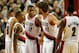 Dec 2, 2013; Portland, OR, USA; Portland Trail Blazers power forward LaMarcus Aldridge (12) speaks with small forward Nicolas Batum (88), point guard Damian Lillard (0), center Robin Lopez (42) and shooting guard Wesley Matthews (2) during the fourth quarter of the game against the Indiana Pacers at the Moda Center. The Blazers won the game 106-102. Mandatory Credit: Steve Dykes-USA TODAY Sports