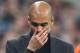 Bayern head coach Pep Guardiola touches his face during the Champions League semifinal second leg soccer match between Bayern Munich and Real Madrid at the Allianz Arena in Munich, southern Germany, Tuesday, April 29, 2014. (AP Photo/Matthias Schrader)