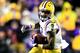 BATON ROUGE, LA - NOVEMBER 23: Wide receiver Odell Beckham Jr. #3 of the LSU Tigers runs the ball against the Texas A&M Aggies at Tiger Stadium on November 23, 2013 in Baton Rouge, Louisiana. (Photo by Sean Gardner/Getty Images)