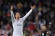 MADRID, SPAIN - APRIL 26: Cristiano Ronaldo of Real Madrid CF celebrates after scoring Real's 2nd goal from a free kick during the La Liga match between Real Madrid CF and CA Osasuna at the Santiago Bernabeu stadium on April 26, 2014 in Madrid, Spain. (Photo by Denis Doyle/Getty Images)