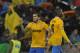 Juventus's Carlos Tevez of Argentina celebrates after scoring a goal during their Serie A soccer match against Sassuolo, at Reggio Emilia's Mapei stadium, Italy, Monday, April 28, 2014. (AP Photo/Marco Vasini)