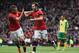 MANCHESTER, ENGLAND - APRIL 26: Juan Mata of Manchester United celebrates scoring the third goal with Tom Cleverley during the Barclays Premier League match between Manchester United and Norwich City at Old Trafford on April 26, 2014 in Manchester, England. (Photo by Laurence Griffiths/Getty Images)