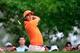 AUGUSTA, GA - APRIL 13: Rickie Fowler of the United States watches his tee shot on the fourth tee during the final round of the 2014 Masters Tournament at Augusta National Golf Club on April 13, 2014 in Augusta, Georgia. (Photo by Rob Carr/Getty Images)