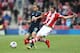 STOKE ON TRENT, ENGLAND - APRIL 26: Erik Pieters of Stoke City in action with Andros Townsend of Tottenham Hotspur during the Barclays Premier League match between Stoke City and Tottenham Hotspur at the Britannia Stadium on April 26, 2014 in Stoke on Trent, England. (Photo by Clive Brunskill/Getty Images)