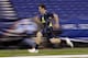 Texas A&M quarterback Johnny Manziel runs the 40-yard dash at the NFL football scouting combine in Indianapolis, Sunday, Feb. 23, 2014. (AP Photo/Michael Conroy)