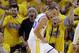 Golden State Warriors' Stephen Curry, center, celebrates after blocking a shot during the second half in Game 4 of an opening-round NBA basketball playoff series against the Los Angeles Clippers on Sunday, April 27, 2014, in Oakland, Calif. Golden State won 118-97. (AP Photo/Marcio Jose Sanchez)