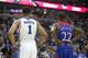 Duke forward Jabari Parker (1) and Kansas guard Andrew Wiggins (22) wait for a free throw during the second half of an NCAA college basketball game Tuesday, Nov. 12, 2013, in Chicago. Kansas won 94-83. (AP Photo/Charles Rex Arbogast)