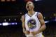 FILE - In this April 27, 2014, file photo, Golden State Warriors' Stephen Curry celebrates after scoring against the Los Angeles Clippers during the first half in Game 4 of an opening-round NBA basketball playoff series in Oakland, Calif.