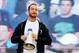 WWE superstar CM Punk addresses the crowd from the Madison Square Garden marquee, Friday, Nov. 18, 2011, in New York, during a rally leading up to the 25th Anniversary of Survivor Series, taking place Sunday at Madison Square Garden. The event will feature actor and wrestling favorite Dwayne