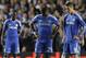 Chelsea's Samuel Eto'o, left and teammate Chelsea's Fernando Torres wait to re-start the game after Atletico scored their second goal during the Champions League semifinal second leg soccer match between Chelsea and Atletico Madrid at Stamford Bridge stadium in London, Wednesday, April 30, 2014. (AP Photo/Matt Dunham)