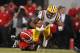 LSU's Odell Beckham Jr (3) is tackled by Georgia's T.J. Stripling during the second half of an NCAA football game, Saturday, Sept. 28, 2013, in Athens, Ga. Georgia 44-41. (AP Photo/Mike Stewart)