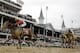 ADVANCE FOR WEEKEND EDITIONS, APRIL 26-27 - FILE - In this May 4, 2013 file photo, Joel Rosario rides Orb, left, to victory in the 139th Kentucky Derby at Churchill Downs in Louisville, Ky. A full field of 20 is expected for the 140th Kentucky Derby on May 3, 2014. (AP Photo/David J. Phillip, File)
