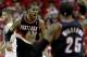 Portland Trail Blazers' LaMarcus Aldridge (12) reacts after making a basket while being fouled during the fourth quarter in Game 1 of an opening-round NBA basketball playoff series against the Houston Rockets Sunday, April 20, 2014, in Houston. The Trail Blazers won 122-120 in overtime. (AP Photo/David J. Phillip)