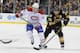 BOSTON, MA - MARCH 24: Patrice Bergeron #37 of the Boston Bruins skates against Daniel Briere #48 of the Montreal Canadiens at the TD Garden on March 24, 2014 in Boston, Massachusetts. (Photo by Steve Babineau/NHLI via Getty Images)
