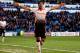 CARDIFF, WALES - MARCH 22: Luis Suarez of Liverpool celebrates after scoring hihs third and his team's sixth goal of the game during the Barclays Premier League match between Cardiff City and Liverpool at Cardiff City Stadium on March 22, 2014 in Cardiff, Wales. (Photo by Ben Hoskins/Getty Images)