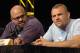 John Hackleman (left) sits with Chuck Liddell at a press conference.